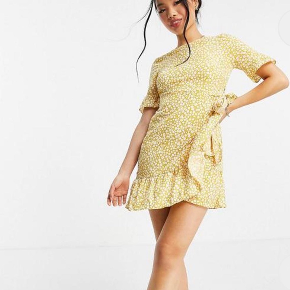 ASOS Super cute Yellow polka dot dress with a wrap tie in the front.